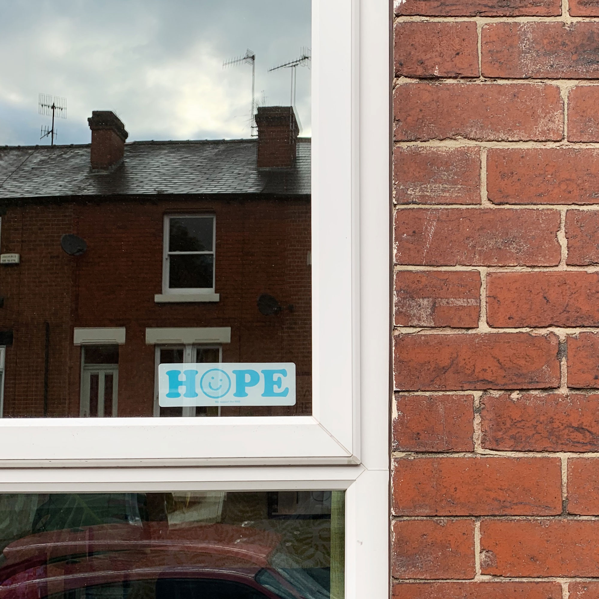 NHS Hope sticker in window